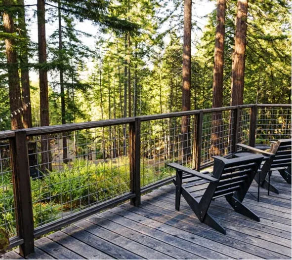 Modern wood deck overlooking a forested backyard in Eugene, Oregon
